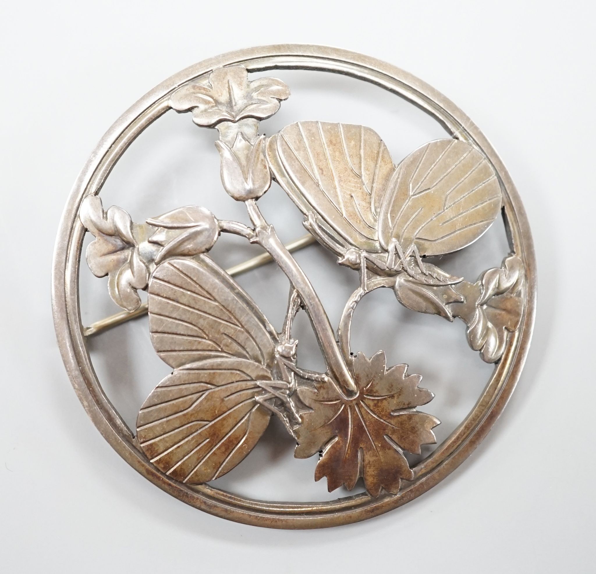 A modern George Jensen sterling twin moth circular brooch, no. 283, 54mm.